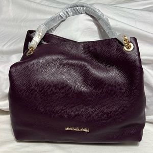 Michael Kors plum color shoulder bag